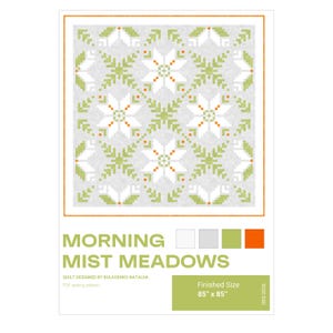 May include: A quilt pattern titled "Morning Mist Meadows" with a repeating floral design in white, green, and orange on a gray background. The finished size is 85" x 85".