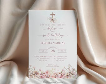 May include: A white invitation card with floral accents, announcing a baptism and first birthday celebration. The text includes the name "Sophia Vargas", date, time, and location details. A cross and flowers adorn the top.