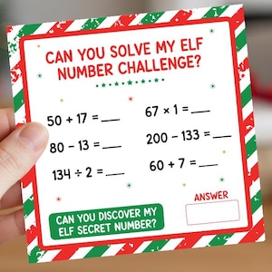 May include: A Christmas-themed card with a red and green border, featuring the text "CAN YOU SOLVE MY ELF NUMBER CHALLENGE?". The card includes math problems and a space for an answer, with the text "CAN YOU DISCOVER MY ELF SECRET NUMBER?"