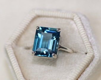 12x10 Emerald Cut London Blue Topaz Solitaire Ring