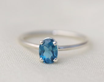 7x5 Oval London Blue Topaz Solitaire Ring