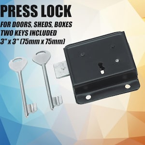 May include: A black press lock with two silver keys. The lock measures 75mm x 75mm. The image text reads: PRESS LOCK, FOR DOORS, SHEDS, BOXES, TWO KEYS INCLUDED, 3" x 3" (75mm x 75mm).
