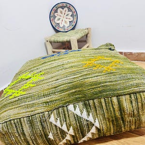 Vintage Moroccan Rug Pouf: Handwoven Berber Ottoman, Earthy Tones
