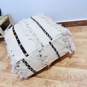 Handmade Berber Wool Floor Pouf: Vintage Moroccan Ottoman
