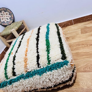 Handwoven Berber Wool Moroccan Pouf: Earthy Tones, Boho Decor