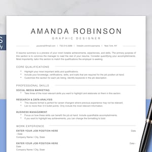 Op de afbeelding: Een witte cv-sjabloon met de naam "AMANDA ROBINSON" bovenaan, met het label "GRAPHIC DESIGNER". Het document bevat secties voor kernkwalificaties, professionele vaardigheden en werkervaring. Een zwarte pen ligt aan de rechterkant.