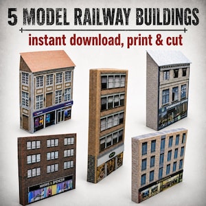 May include: Five model railway buildings featuring printed brick and stone facades with storefronts for NatWest, Starbucks Coffee, Marks & Spencer, Schuh, and Waterstones. The text reads 5 MODEL RAILWAY BUILDINGS and instant download, print & cut.