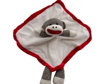 Manta de seguridad Baby Starters Sock Monkey con ribete de satén rojo y blanco de 11 pulgadas