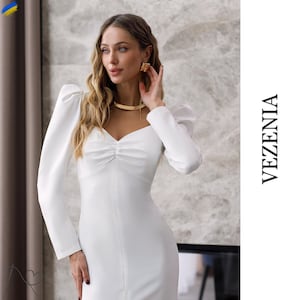 Elegant white midi dress with long sleeves in a chic individual style, Stylish white midi dress of exquisite individual design