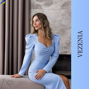 Stylish fitted midi dress in pale blue with long sleeves, Elegant blue midi dress with long sleeves chic fitted dress