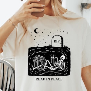 Skeleton Reading Book T-Shirt