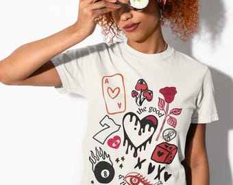 Camiseta con gráfico de corazón con tatuaje grunge y símbolo de los 7 ojos de Dice Rose