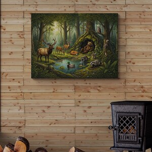 Close-up of a large 30 x 40 wrapped gallery canvas in a cozy cabin setting with wood plank walls and a cast-iron stove. The storybook-inspired woodland artwork features a bear beside its den with elk, deer, fox, raccoons, badger, rabbit, duck, turtle, owl and squirrel in a tranquil forest clearing.