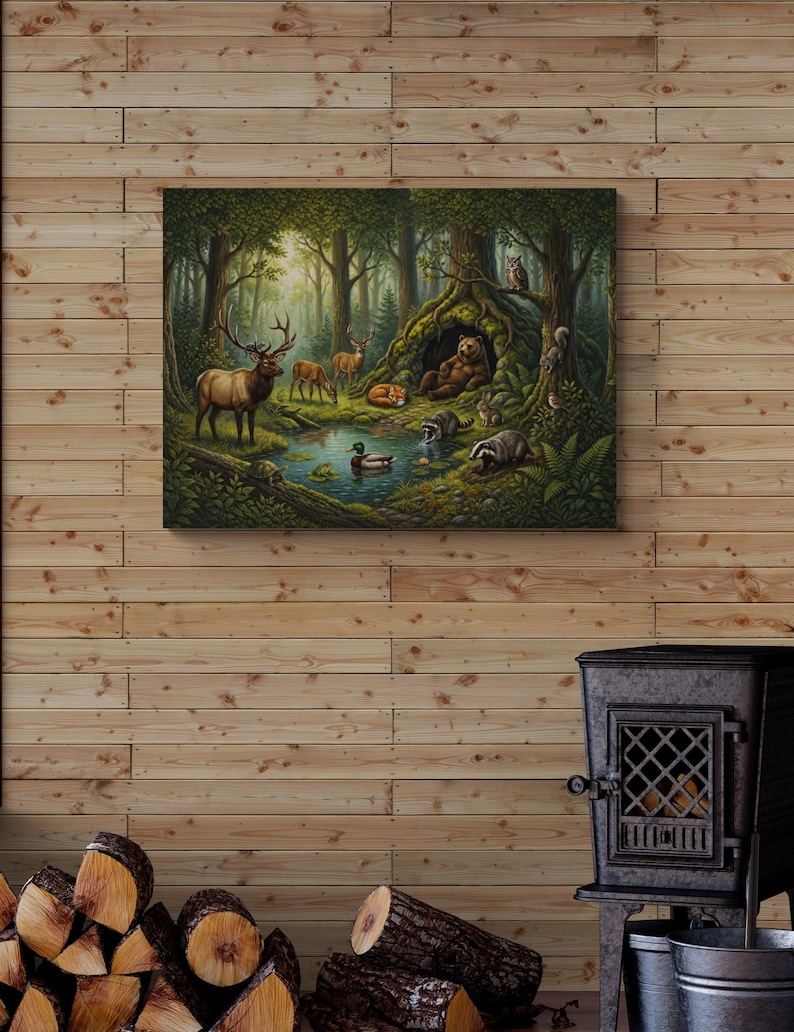 Close-up of a large 30 x 40 wrapped gallery canvas in a cozy cabin setting with wood plank walls and a cast-iron stove. The storybook-inspired woodland artwork features a bear beside its den with elk, deer, fox, raccoons, badger, rabbit, duck, turtle, owl and squirrel in a tranquil forest clearing.
