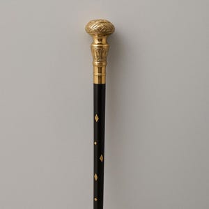 Vintage Foldable Walking Cane: Black Wood with Brass Knob