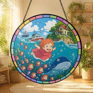May include: Round stained glass window featuring a vibrant ocean scene with a cartoon character, boats, and a whale. The window has a colorful border and is suspended by a chain. The image evokes a sense of adventure and fantasy.
