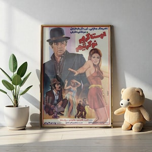 May include: A framed vintage movie poster with a gold frame. The poster features illustrations of several people, including a man in a hat and a woman in a red dress. The poster has text in a foreign language.