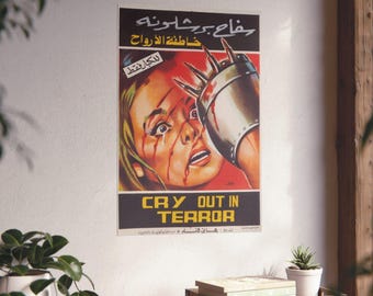 May include: A vintage horror movie poster titled "Cry Out in Terror." The poster features a distressed woman with blood running down her face, and a metallic claw. The poster has text in English and Arabic.