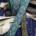 Green woven folk art Jacquard 1 1/8 inch wide fabric trim