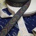 Purple woven folk art Jacquard 1 1/4 inch wide fabric trim