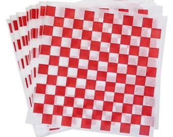 May include: A stack of red and white checkered paper squares. The paper is thin and has a slightly crinkled texture.