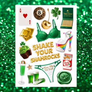 May include: A collage of St. Patrick's Day themed stickers on a green glitter background. Includes a green bra, high heels with a rainbow platform, a cupcake, and the text "Shake Your Shamrocks".