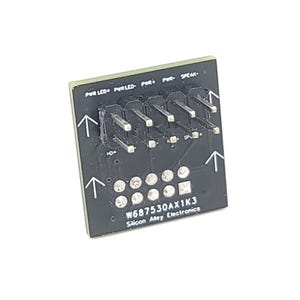 Puede incluir: Una placa de circuito negra con pines y el texto "PWR LED+", "PWR LED-", "PWR+", "PWR-" y "SPEAK-". La placa también muestra "W687530AX1K3" y "Silicon Alley Electronics".