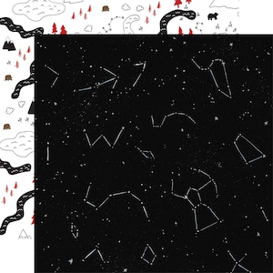 May include: A two-sided paper with a whimsical design. One side features a black background with white constellations. The other side has a white background with a river, trees, mountains, and bears in black and red.