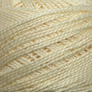 May include: Close-up of a skein of cream-colored yarn. The yarn is tightly wound, showing individual strands with a slight sheen. The texture appears soft and suitable for knitting or crochet projects.