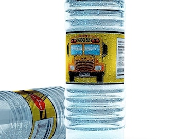 May include: Two clear plastic water bottles with blue caps. The bottle on the right has a yellow label with a school bus graphic and the text "On the Go! School Bus".