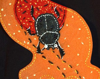 Dyngbaggemönster med planaria-fläck