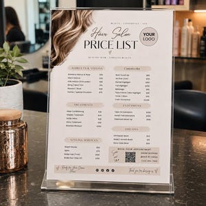 May include: A vertical acrylic sign holder displaying a hair salon price list. The menu features sections for haircuts, styling, color, treatments, extensions, and add-ons, with a QR code for booking appointments and a graphic of wavy blonde hair.