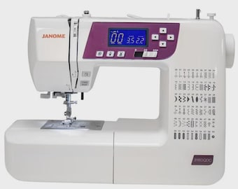 May include: A white Janome 3160QDC sewing machine with a purple accent panel and a digital display. The machine features various stitch options and a needle. The brand name is visible on the machine.