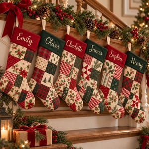 May include: Six quilted Christmas stockings hanging in a row, each featuring a unique patchwork pattern of red, green, and cream fabrics with holly and plaid prints. Each stocking has a solid cuff embroidered with the names Emily, Oliver, Charlotte, James, Sophia, and Henry.