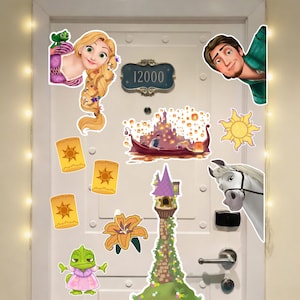 May include: A collection of colorful stickers featuring characters and scenes from a popular animated movie. Includes images of a princess, a tower, a boat, a horse, and lanterns. The number "12000" is also visible.