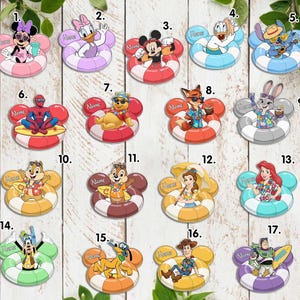 May include: A collection of colorful character-themed floaties, each featuring a different cartoon figure. The floaties are in various colors, including red, blue, yellow, and pink, and are shaped like Mickey Mouse ears. Each floatie has a space for a name.