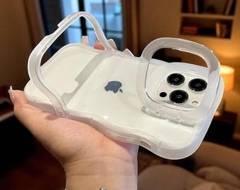 Funda TransparaStand ShockGuard: funda transparente resistente a impactos para iPhone con soporte plegable 3D