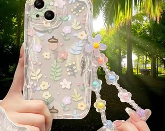 Funda BloomBead con correa floral: Funda de silicona antigolpes para iPhone con colgante de pulsera de cuentas.