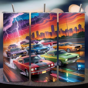 May include: Tumbler featuring a vibrant illustration of classic muscle cars racing against a dramatic sunset and lightning storm. The design showcases various colored cars, including red, green, and blue, with a cityscape backdrop. Includes a silver straw.