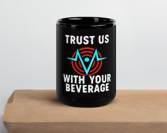 Hazbin Hotel Mug-Trust Us with Your Beverage | The Vees: Vox, Velvette, Valentino RadioStatic