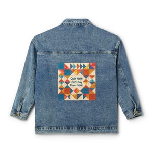 May include: A blue denim jacket featuring a square patch on the back. The patch displays a colourful geometric quilt pattern in shades of red, orange, yellow, and blue, with the text "Quilt Math: 2+2=Buy More Fabric" printed in the centre.