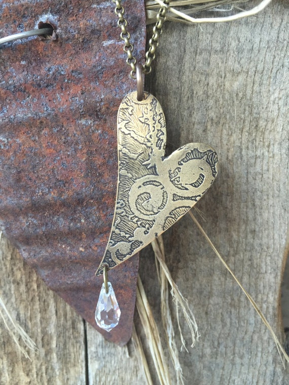 Items similar to offset heart necklace pendant jewelry etched vintaj brass metal heart Swarovski