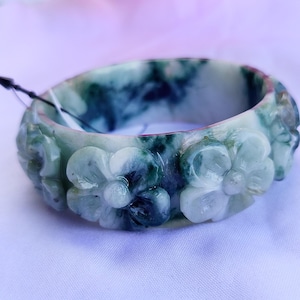 62mm Natural Grade A Burmese Jadeite Bangle Bracelet–25mm Thick, Hand-Carved Pikul Flower Motif in Light Ice Green, Deep Translucent Green