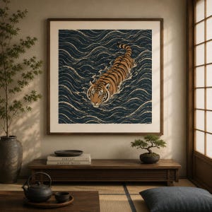 May include: Framed art print featuring a tiger swimming in stylized blue waves. The tiger has orange and black stripes, with a detailed face. The artwork is displayed in a room with Japanese-inspired decor.