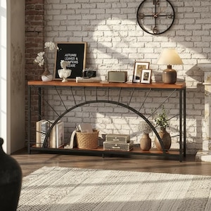 May include: A rustic console table with a dark metal frame and a warm wood top. The table is decorated with a lamp, framed photos, and decorative items. A sign reads "Autumn Leaves & Pumpkins Please".