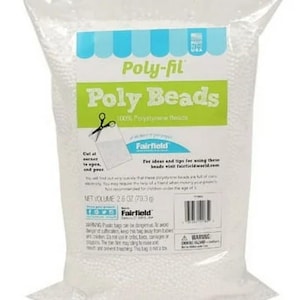 May include: A clear plastic bag of Poly-fil Poly Beads. The bag has a blue and white label with the text "Poly-fil Poly Beads" and "100% Polystyrene Beads". The net volume is 2.8 oz (79.3g).