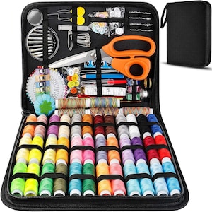 May include: Black zippered sewing kit with a variety of colorful spools of thread, needles, scissors, buttons, and measuring tape. The kit includes a variety of sewing tools and accessories, perfect for crafting and mending projects.