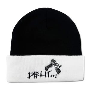 May include: A black and white beanie. The top portion is black, and the folded cuff is white. The cuff features a black graphic of a figure and the text "DIE LIT...!". The beanie is made of a knitted material.
