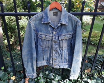 Vintage 1970s Lee Riders Denim Jacket. Blue Jean Trucker Jacket. Sanfordized, PATD 153438. Union Made in USA. Size Small. Men's or Unisex.