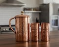 Hand Hammered Copper Pitcher and Tumbler Set: Ayurveda Health product logo